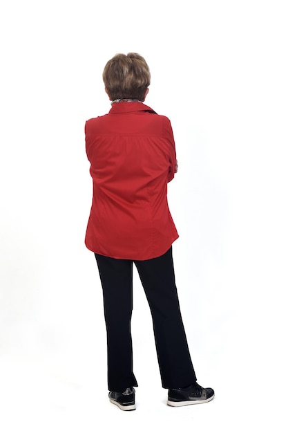 Rear view of senior woman standing