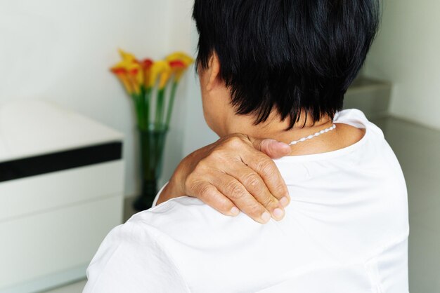 Rear view of a woman at home