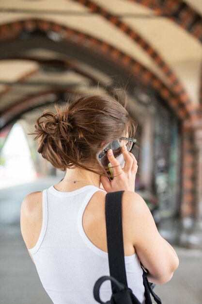 Photo rear view of woman photographing