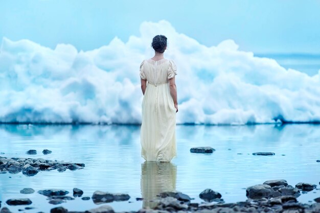 Photo rear view of woman standing in lake
