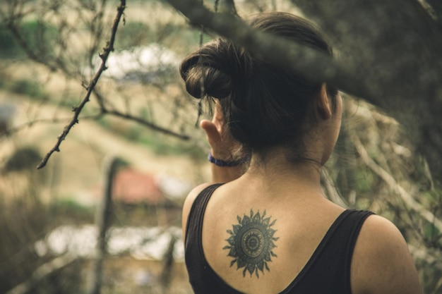 rear view of woman in trees
