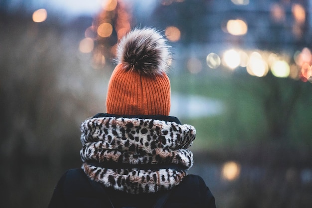 Rear view of woman wearing warm clothes