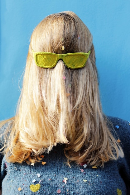 Rear view of woman wearing with blond hair