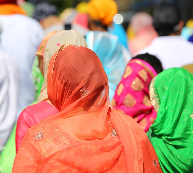 Rear view of women with multi colored leaves