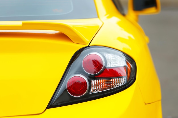 Rear view of yellow car closeup