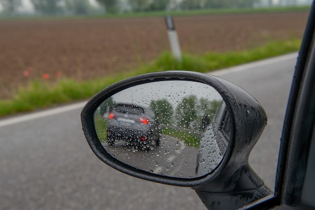 Rearview mirror with water drops