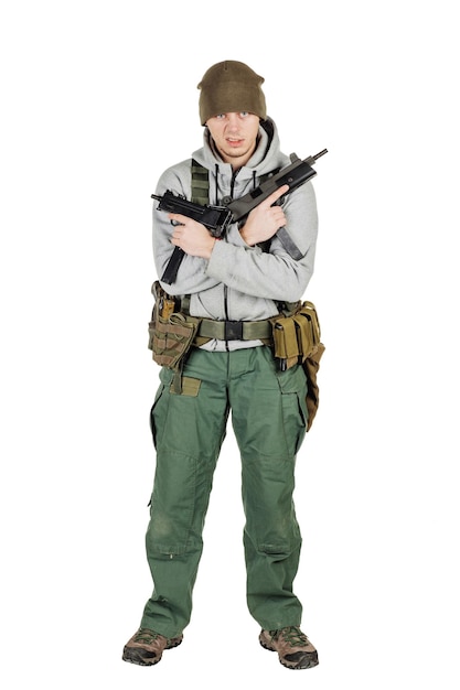 Rebel or private military contractor holding black gun war army weapon technology and people concept Image on a white background