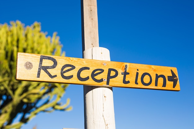 Photo reception sign at a hotel. inscription reception