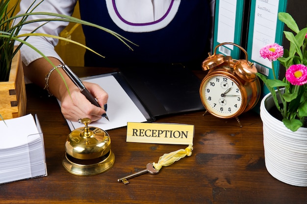 Receptionist of hotel check in