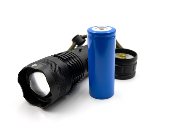 Rechargeable battery for flashlight Black metallic Led Flashlight isolated on white background Core Torch Zoom