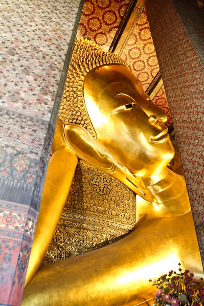 Reclining Buddha gold statue 