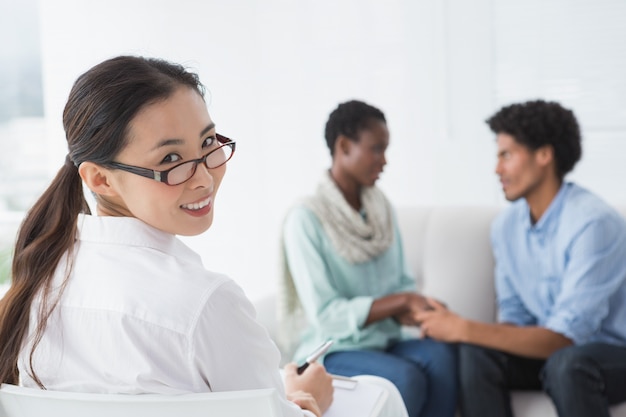 Reconciled couple smiling at each other