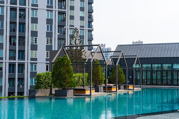 Recreation area with swimming pool in a modern condominium residential complex. Samui , Tailand - 02.08.2020