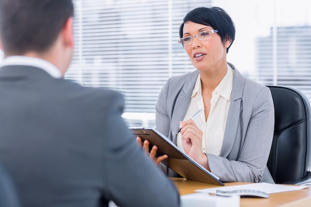 Recruiter checking the candidate during a job interview