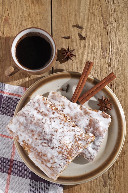 Rectangular glazed gingerbreads and coffee cup