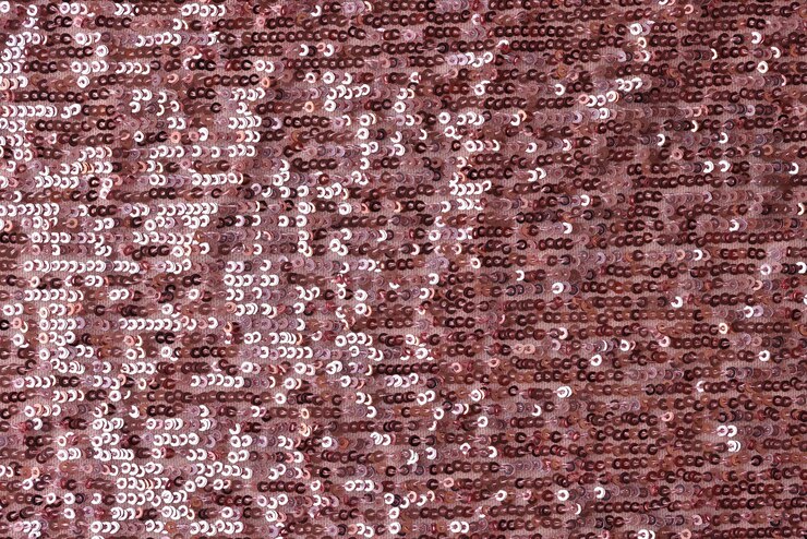 Rectangular red shiny fabric with sequins burgundy fabric and bright texture concept