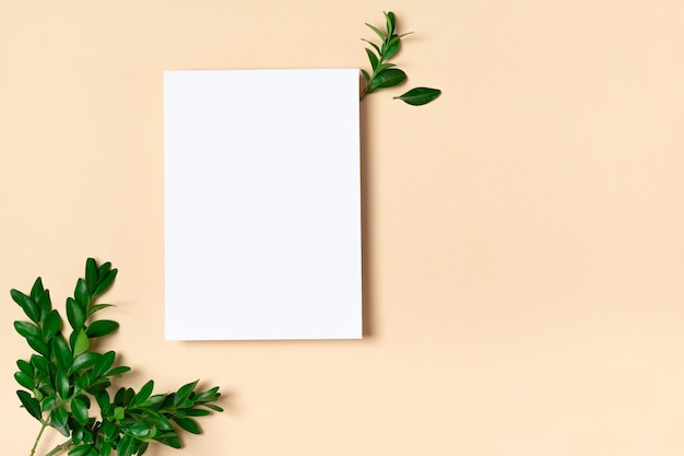 Rectangular vertical or square invitation white greeting card mockup with a boxwood branch