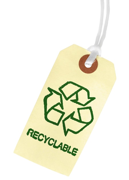 recyclable symbol on a yellow paper tag