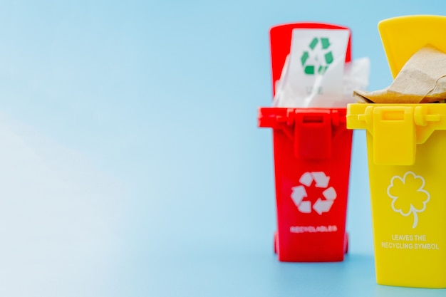 Recycle bins with recycle symbols