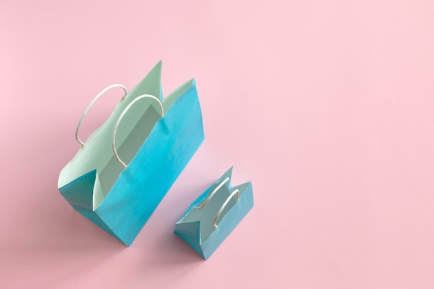Recycle paper bag isolated on pink  Mockup for design