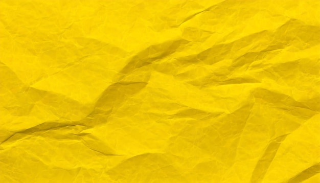 写真 リサイクルされた折りたたまれた黄色い紙の質感またはコピースペースのデザインのための折りたみのページの背景