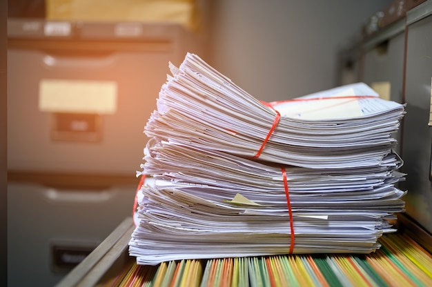 Recycled documents placed on the office filing cabinet