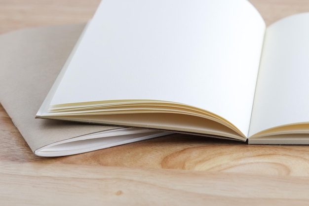 Recycled paper book on wooden background