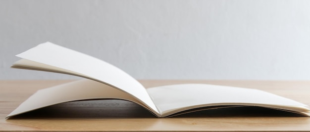 Recycled paper book on wooden background