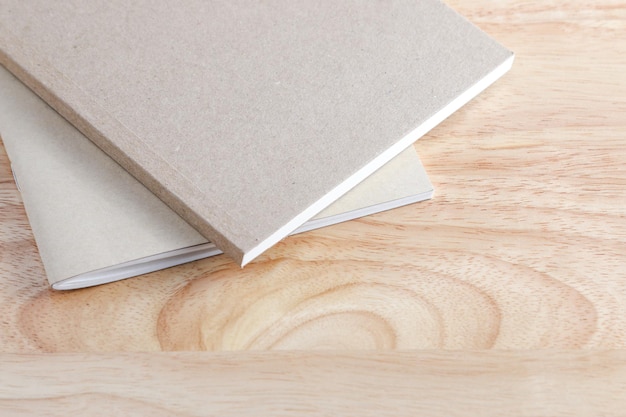 Recycled paper book on wooden background