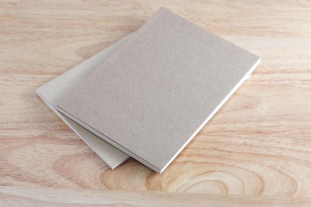 Recycled paper book on wooden background