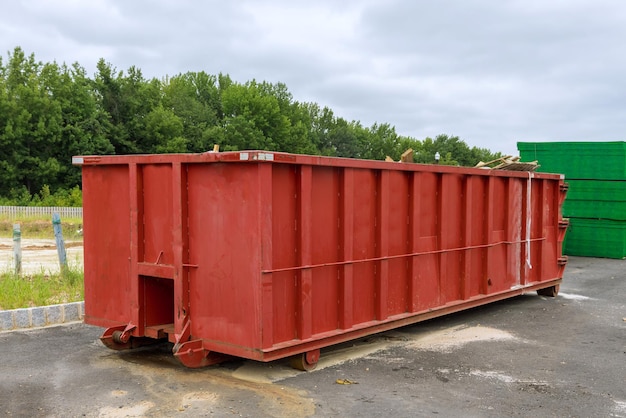 Recycling garbage waste management containers with construction material in the new building