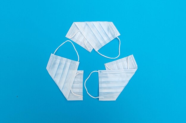 Recycling symbol is made of face masks medical garbage