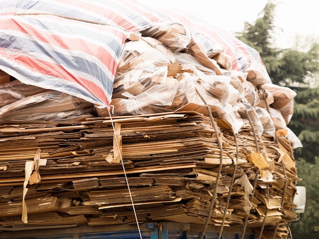 Recycling truck with carton in China.