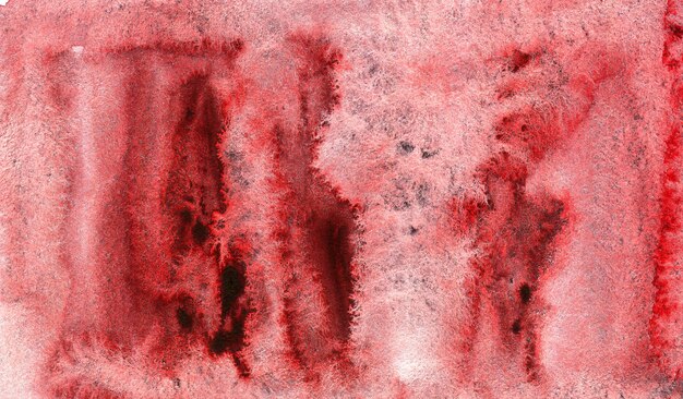 Photo red abstract watercolor background on textured paper