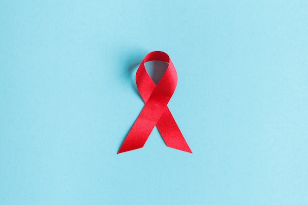 Red AIDS awareness ribbon. World aids day and healthcare and medicine concept