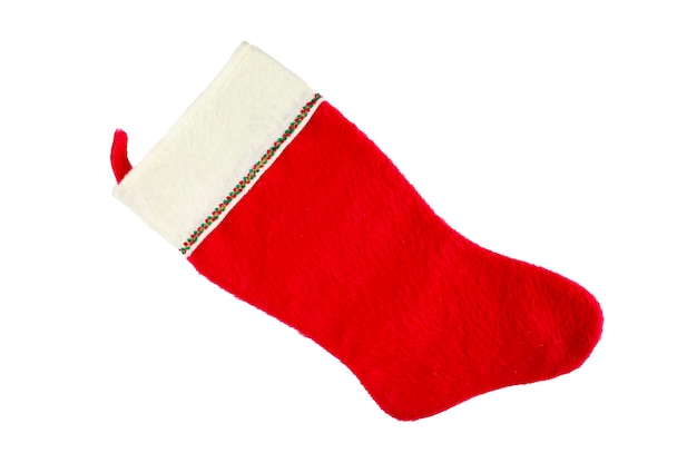 Фото Красно-белый рождественский носок на изолированном пространстве