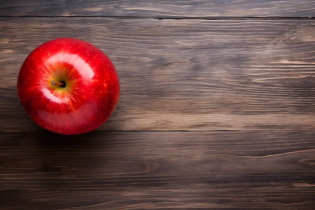 写真 木製の背景に赤いリンゴ