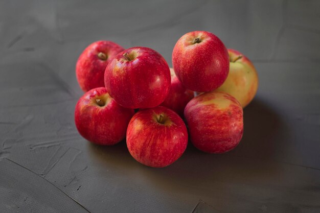 Red apples and gray background