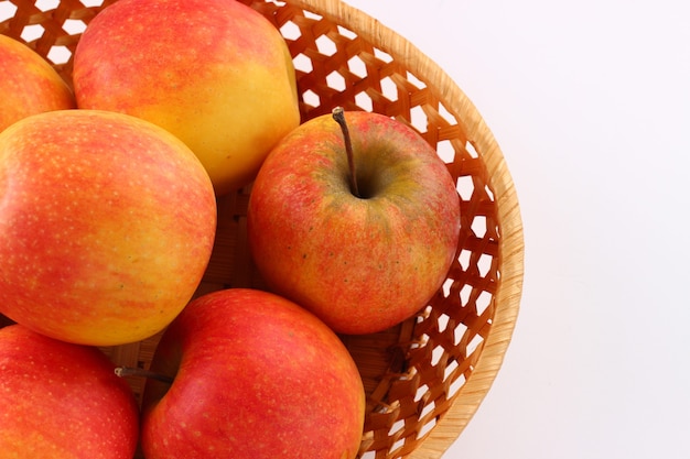 Red apples pinova in a plate