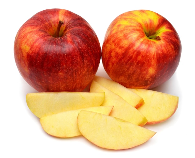 Red apples and slice isolated on white background Perfectly retouched full depth of field on the photo Creative idea fruit juice and drink Top view flat lay