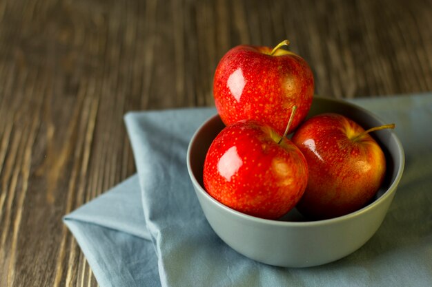 Red apples on the table