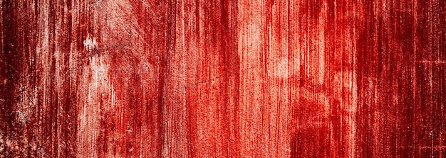 Foto sfondo rosso parete bianca spaventosa con schizzi di sangue per lo sfondo di halloween