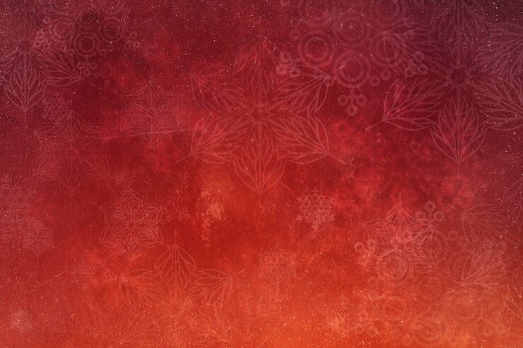 a red background with a pattern of a flower and a red background