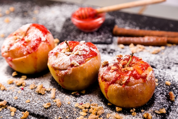 Red Baked Apples Stuffed Cottage Cheese And Granola with Jam. Healthy Diet Food. 