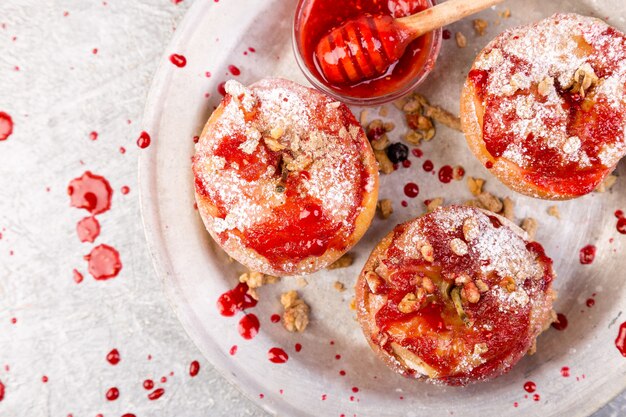 Red Baked Apples Stuffed Cottage Cheese And Granola with Jam. Healthy Diet Food.