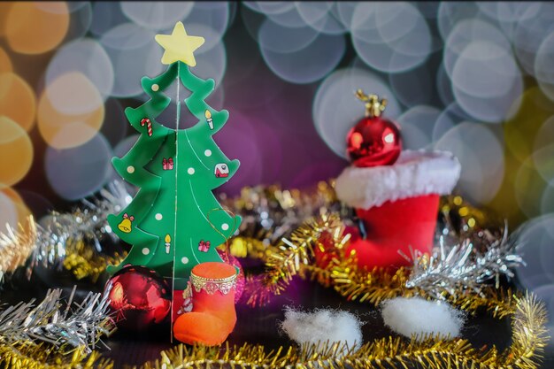 Red ball christmas decoration on green pine tree