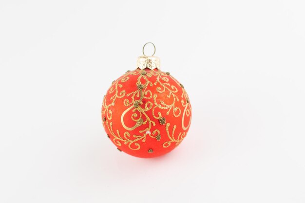 Red ball for christmas tree on white background