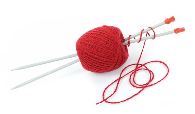 Red ball of yarn with knitting