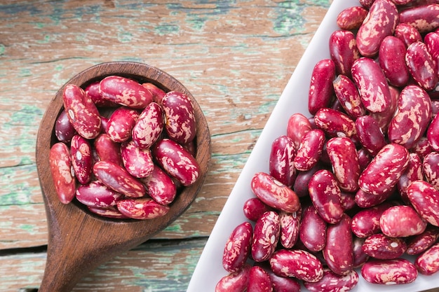 Red bean in bowl on the table Phaseolus vulgaris