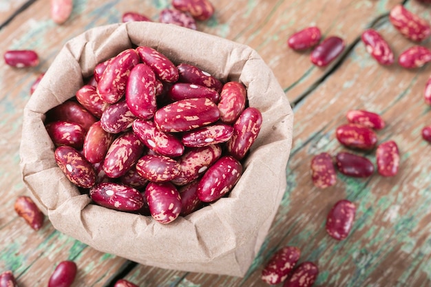 Red bean in bowl on the table Phaseolus vulgaris